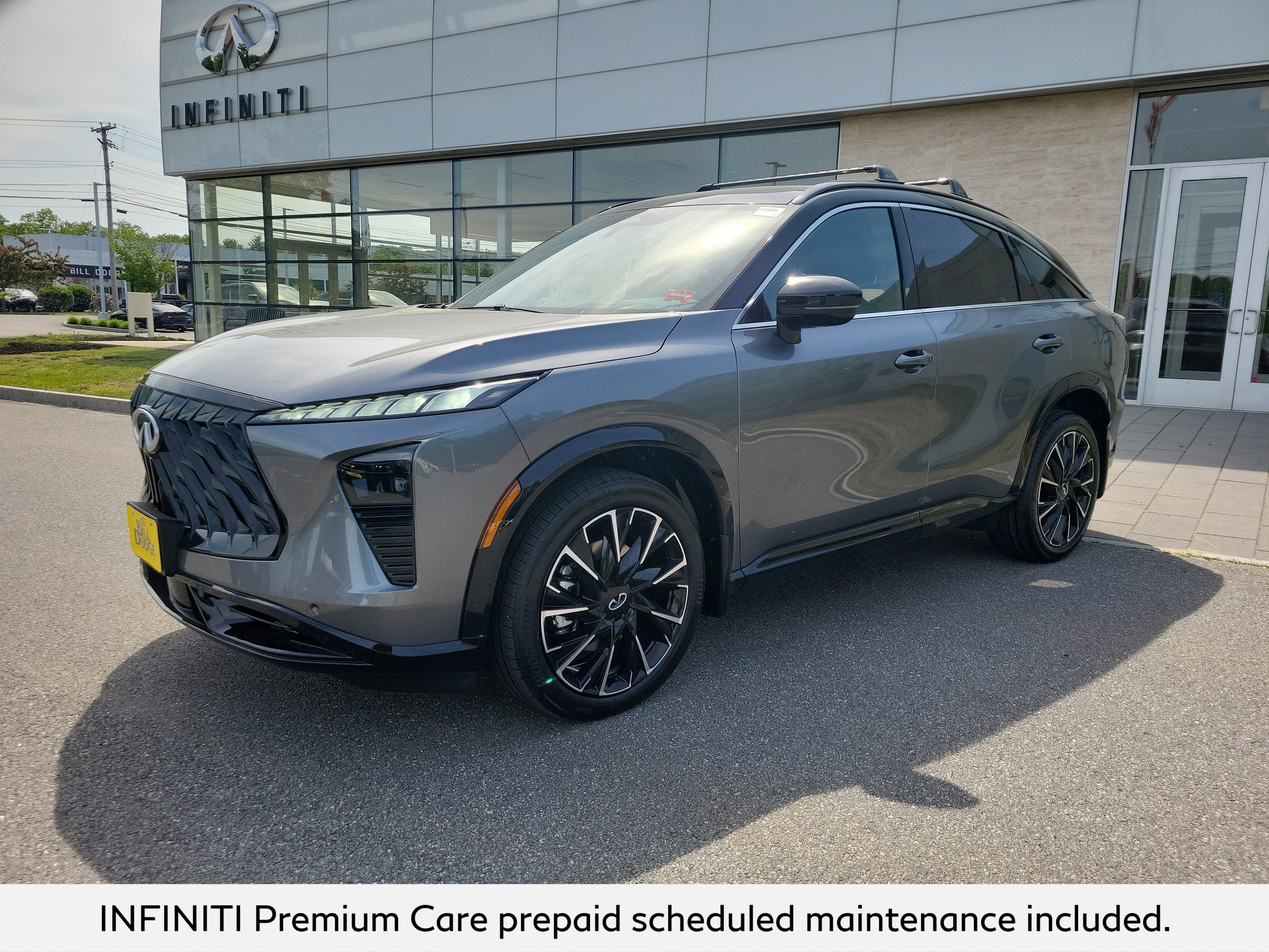 2027 INFINITI QX65 Autograph AWD in Graphite Shadow/Black Obsidian — front three-quarter view