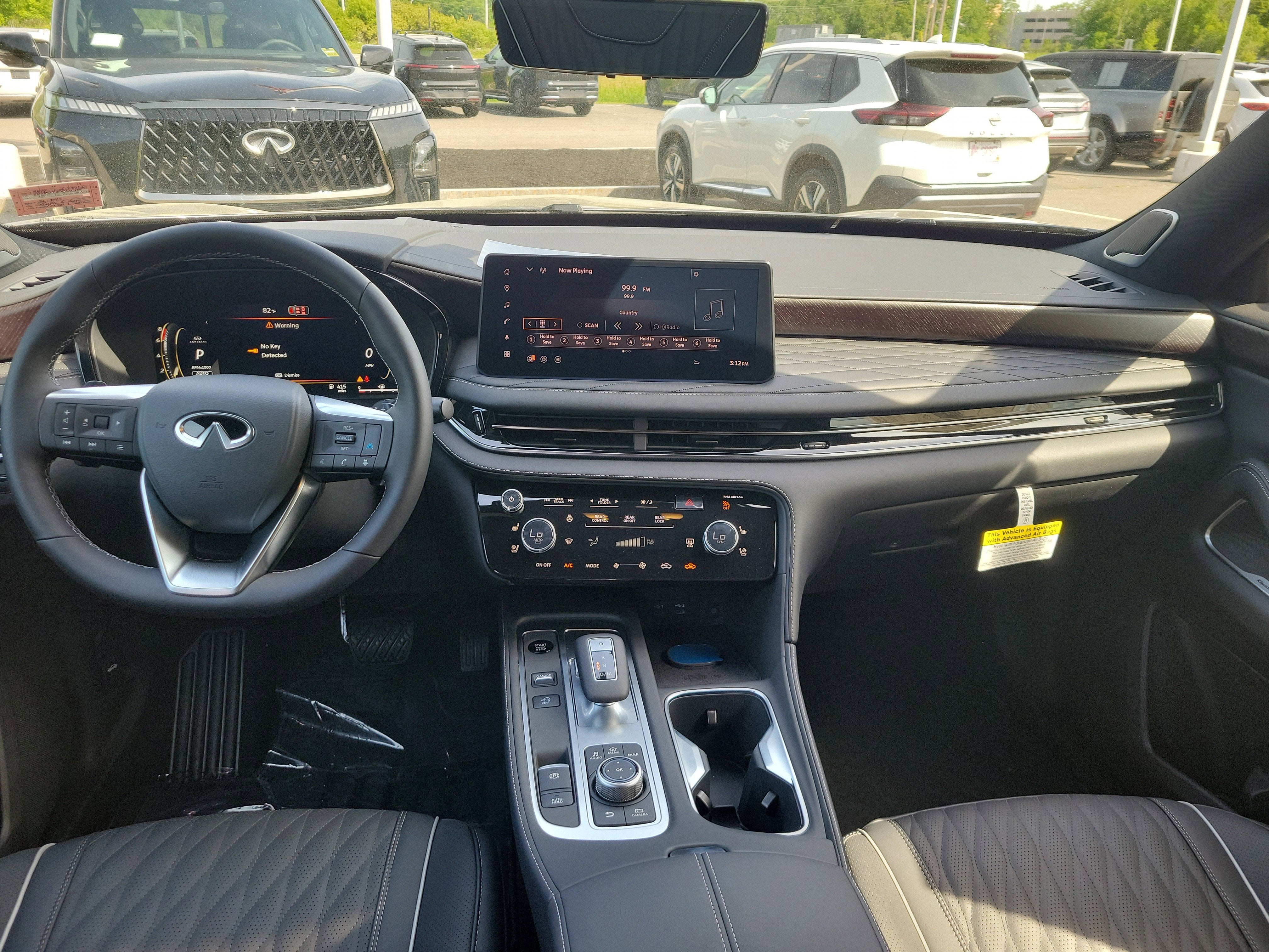 2027 INFINITI QX65 — rear three-quarter view