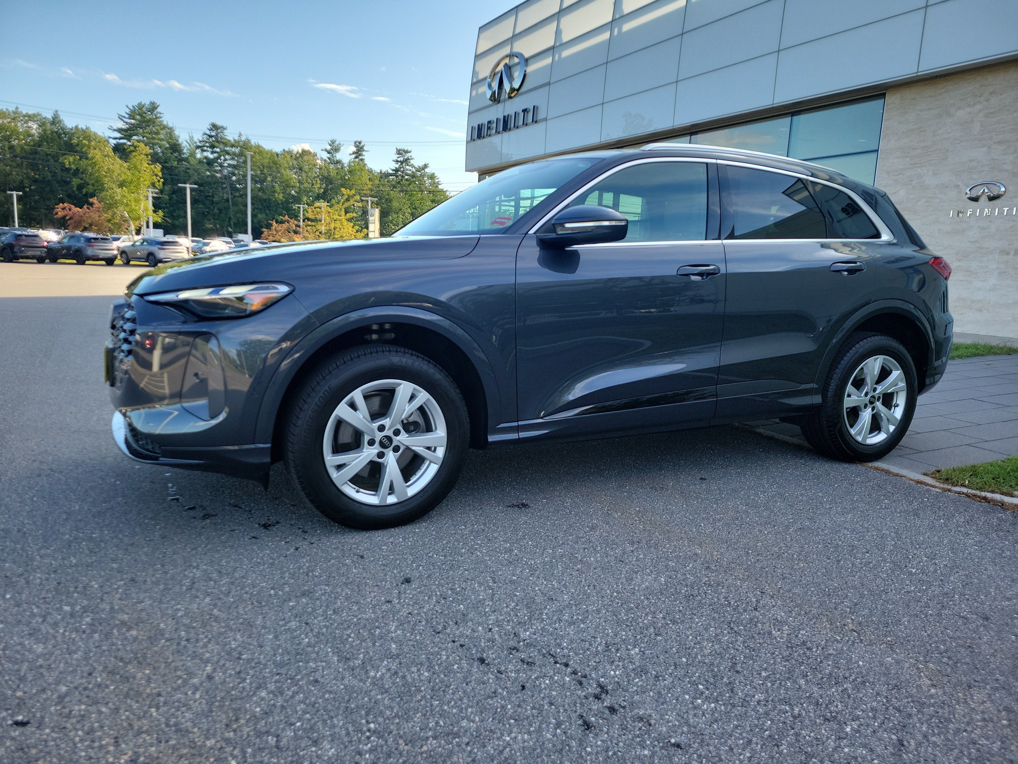 2025 Audi Q5 Premium in Gray Metallic — front three-quarter view